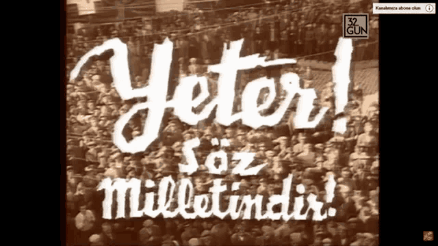 a crowd of people are gathered in front of a sign that says yeter