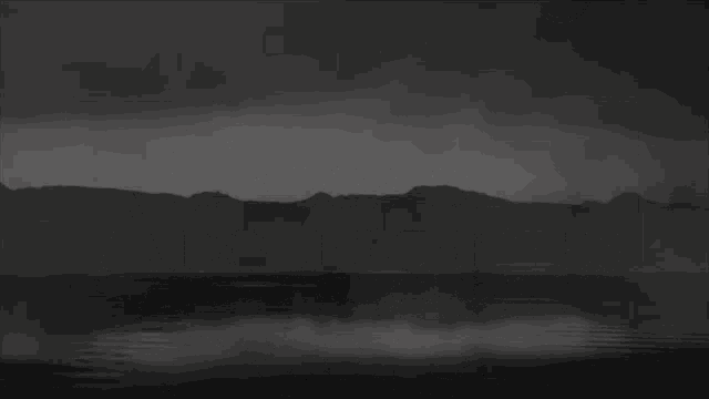 a black and white photo with the letter c in the middle