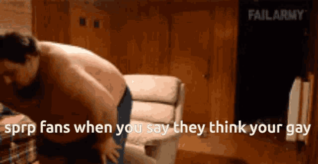 a shirtless man in a living room with the words " they think your gay "