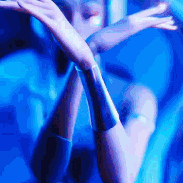 a close up of a person 's arm with a bracelet on it