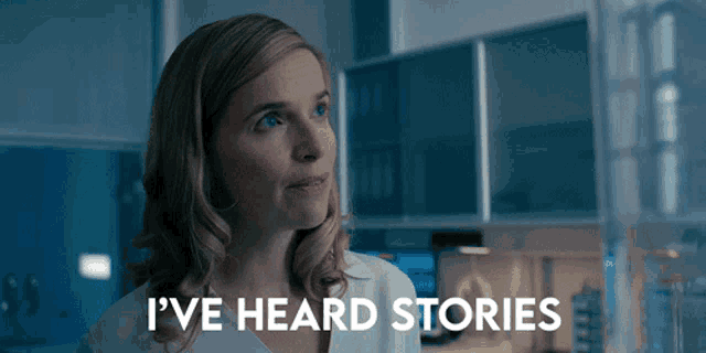 a woman says i 've heard stories in front of a blue background