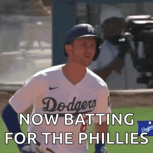 a dodgers baseball player is batting for the phillies