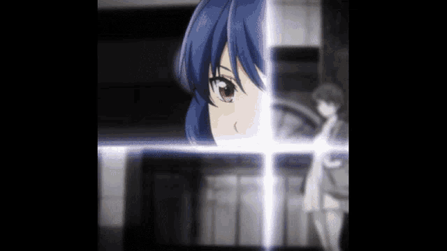a close up of a girl 's face with a cross in the background