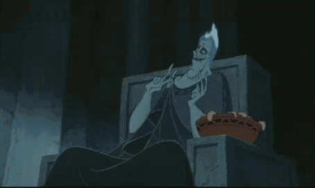 a cartoon character is sitting on a throne holding a torch .