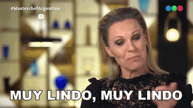a woman says muy lindo muy lindo on a television screen