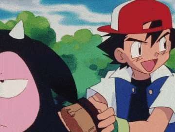 a boy in a red hat is standing next to a pink monster