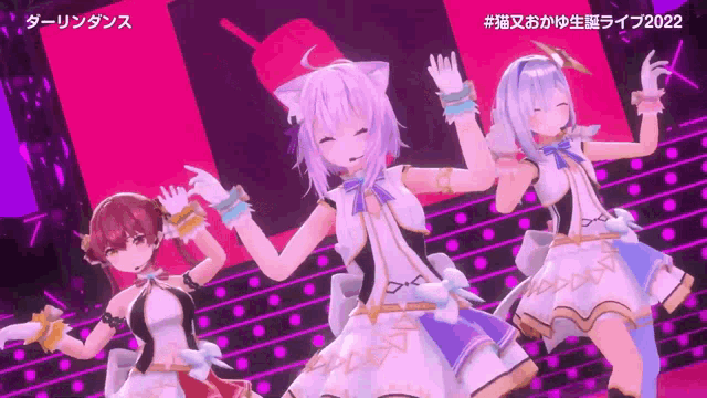 three anime girls are dancing on a stage in a video game