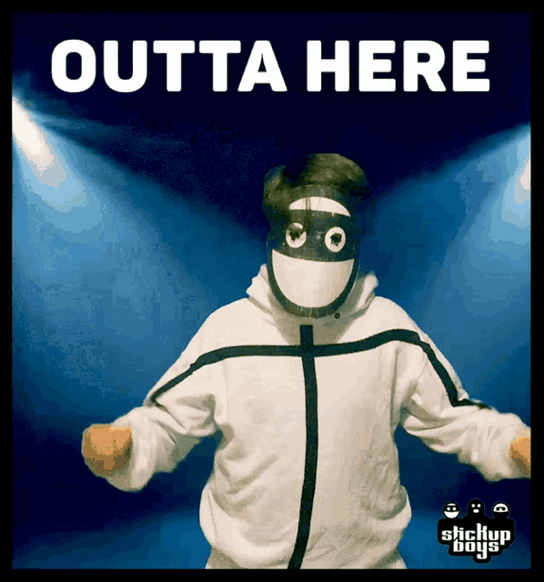 a person wearing a mask with the words outta here written on it