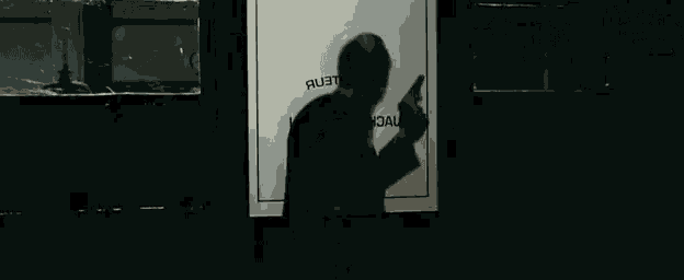 a man in a suit and tie is standing in front of a door that says jack jefferson