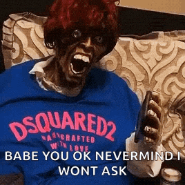 a person wearing a blue shirt that says dsquared2