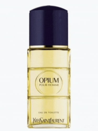 a bottle of opium pour homme cologne next to a box
