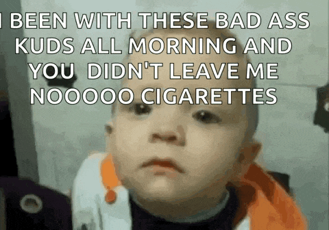 a baby is making a funny face with the words i been with these bad ass kuds all morning and