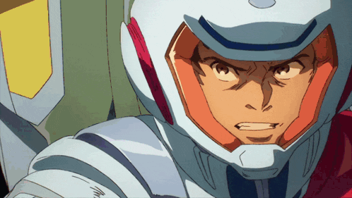 a close up of a man 's face with a white helmet