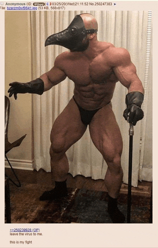 a picture of a muscular man wearing a black mask