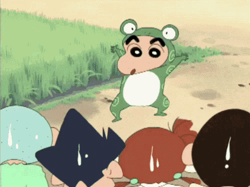 a cartoon character wearing a frog costume is standing in front of a group of children
