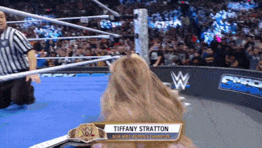 tiffany stratton is the new wwe women 's champion in a wrestling match