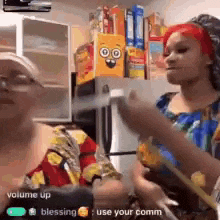 a woman with red hair is holding a knife in a kitchen with boxes of cereal in the background .