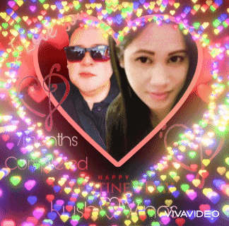 a woman and a girl are in a heart surrounded by hearts