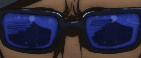 a close up of a person 's eye with blue eyes