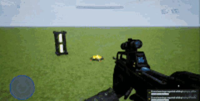 a person holding a gun with the number 36 on the sight