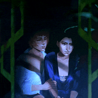 a woman in a blue robe holds the hand of another woman in a white shirt