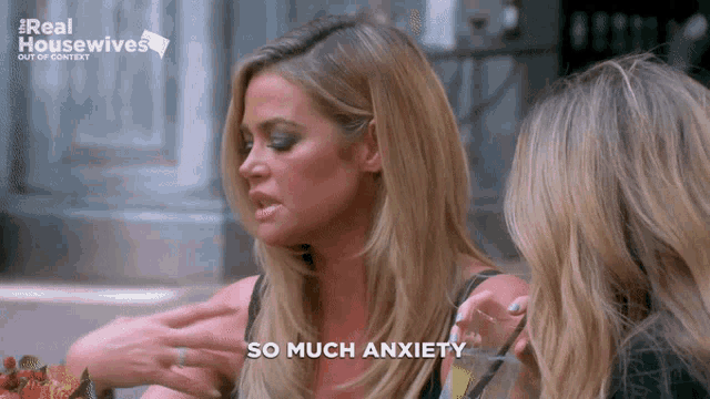 a woman says so much anxiety in front of a real housewives logo