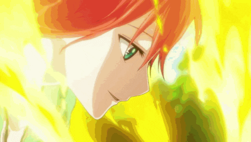 a girl with red hair and green eyes is looking down