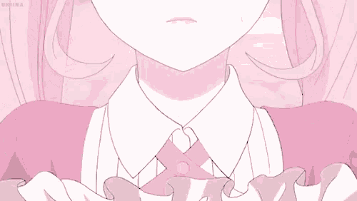 a close up of a girl with pink hair and a pink dress .