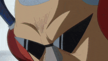 a close up of a cartoon character 's face with a mask on