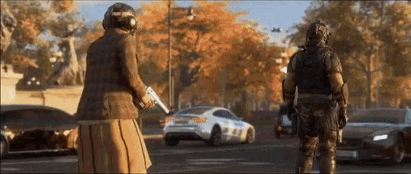 a woman holding a gun stands next to a man with a gun
