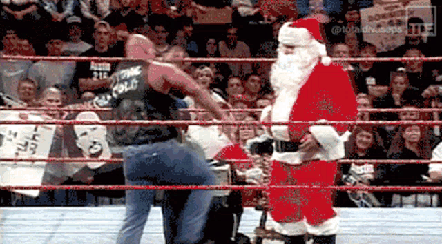 a man in a wrestling ring with the word cold on his shirt