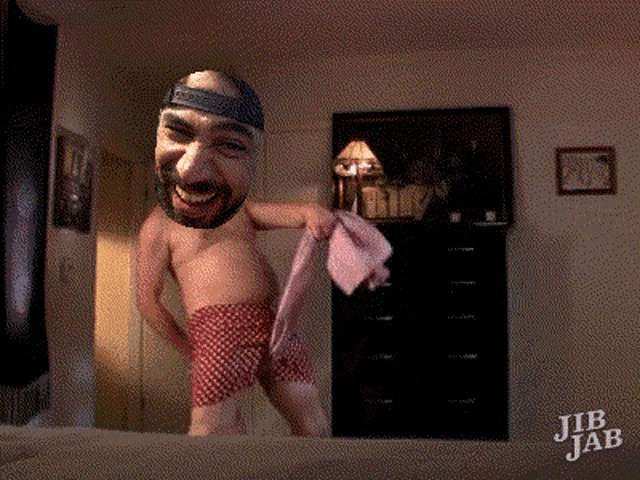 jib jab shows a man without a shirt holding a pink towel