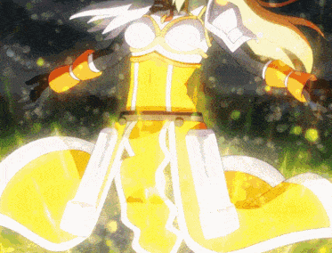 a woman in a yellow and white dress is dancing