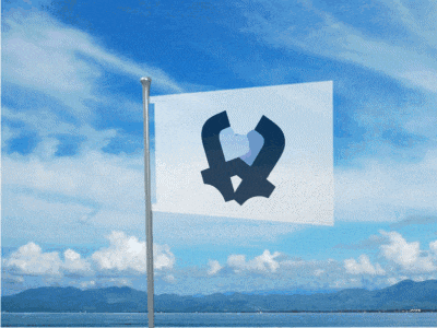 a flag with the letter w on it is flying in front of a blue sky