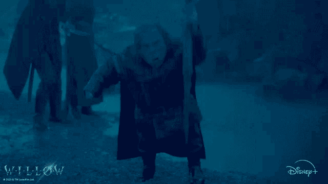 a disney + advertisement for willow shows a person in the water