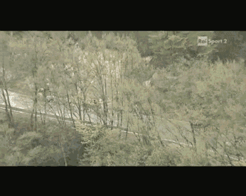 a man riding a bike on a road with rai sport 2 on the bottom right