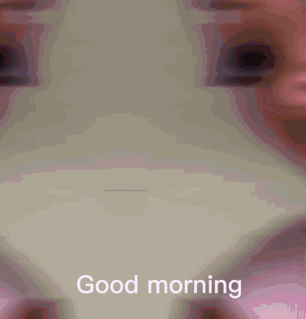 a picture of a face with the words " good morning " on the bottom
