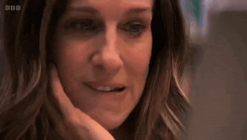 a close up of a woman 's face with bbc written on the bottom right