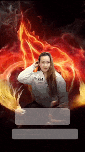 a woman wearing a sweatshirt that says mcm on it