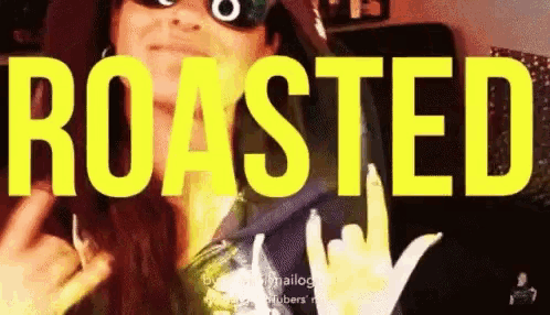 a woman wearing sunglasses is making a hand gesture with the word roasted in the background