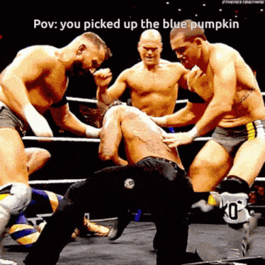 a group of men are wrestling in a ring and the caption says you picked up the blue pumpkin