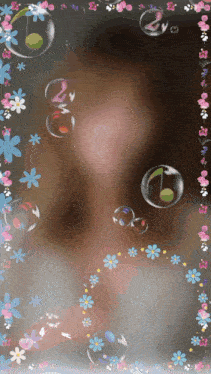 a picture of a girl surrounded by bubbles and flowers with the number 2 in the middle