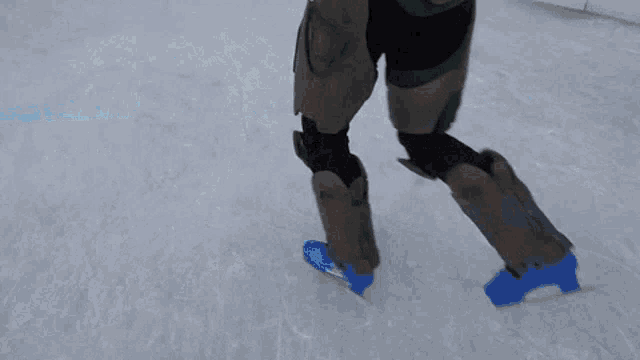 people are ice skating in front of a sign for edmon life & less