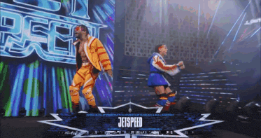 two wrestlers on a stage with a sign that says jetspeed on it