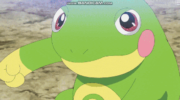 a green and yellow frog is looking up at something