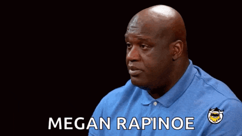 a man in a blue shirt is covering his nose with his hand and the name megan rapinoe is on the bottom