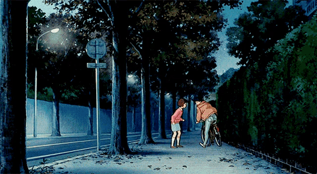 a man and a girl are standing on a sidewalk near a street sign that says no parking