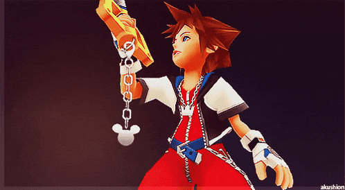 sora from kingdom hearts is holding a key chain with a mickey mouse on it