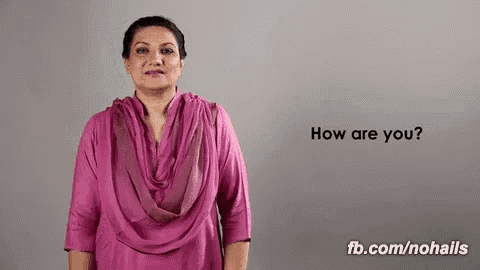 a woman in a pink shirt is asking how are you