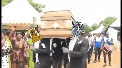 a group of people are carrying a coffin with a cartoon face on it .